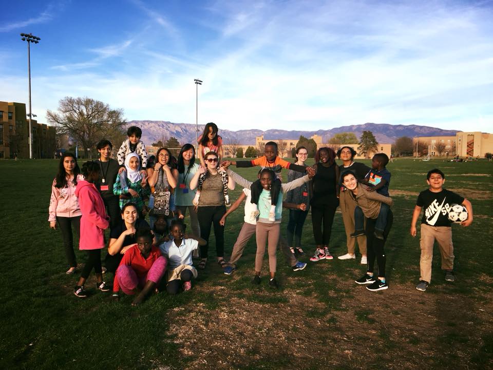 Refugees and supporters on UNM's Johnson Field